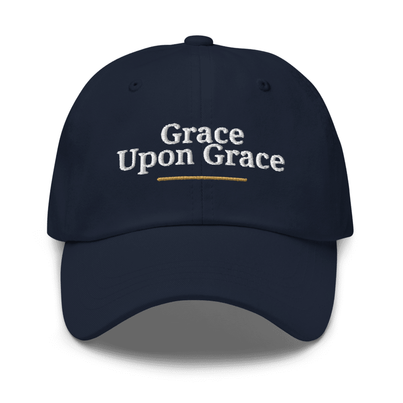 Grace Upon Grace Embroidered Hat in Navy, front